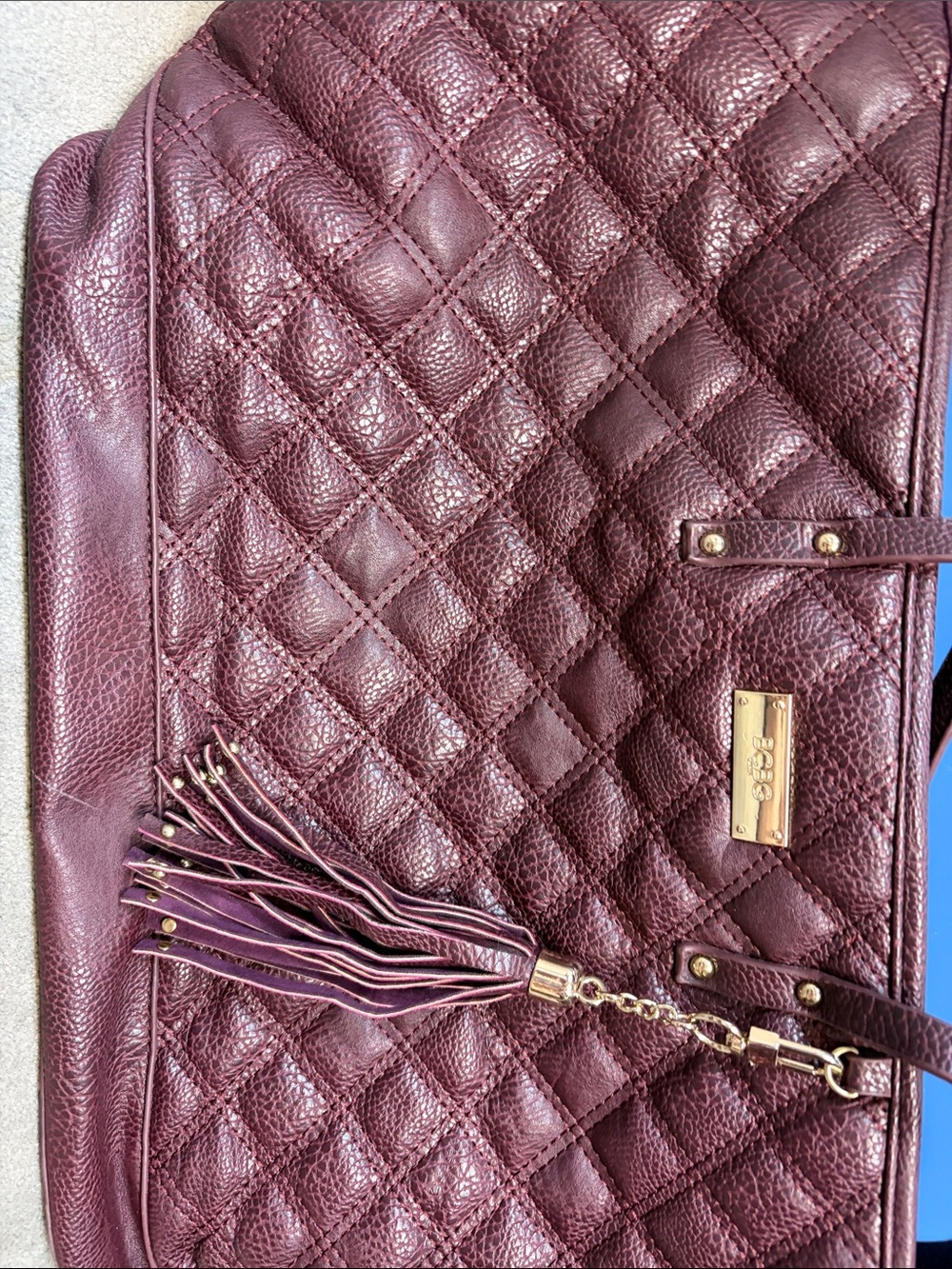 BCBG Paris Quilted Tassel Shoulder Bag in Wine